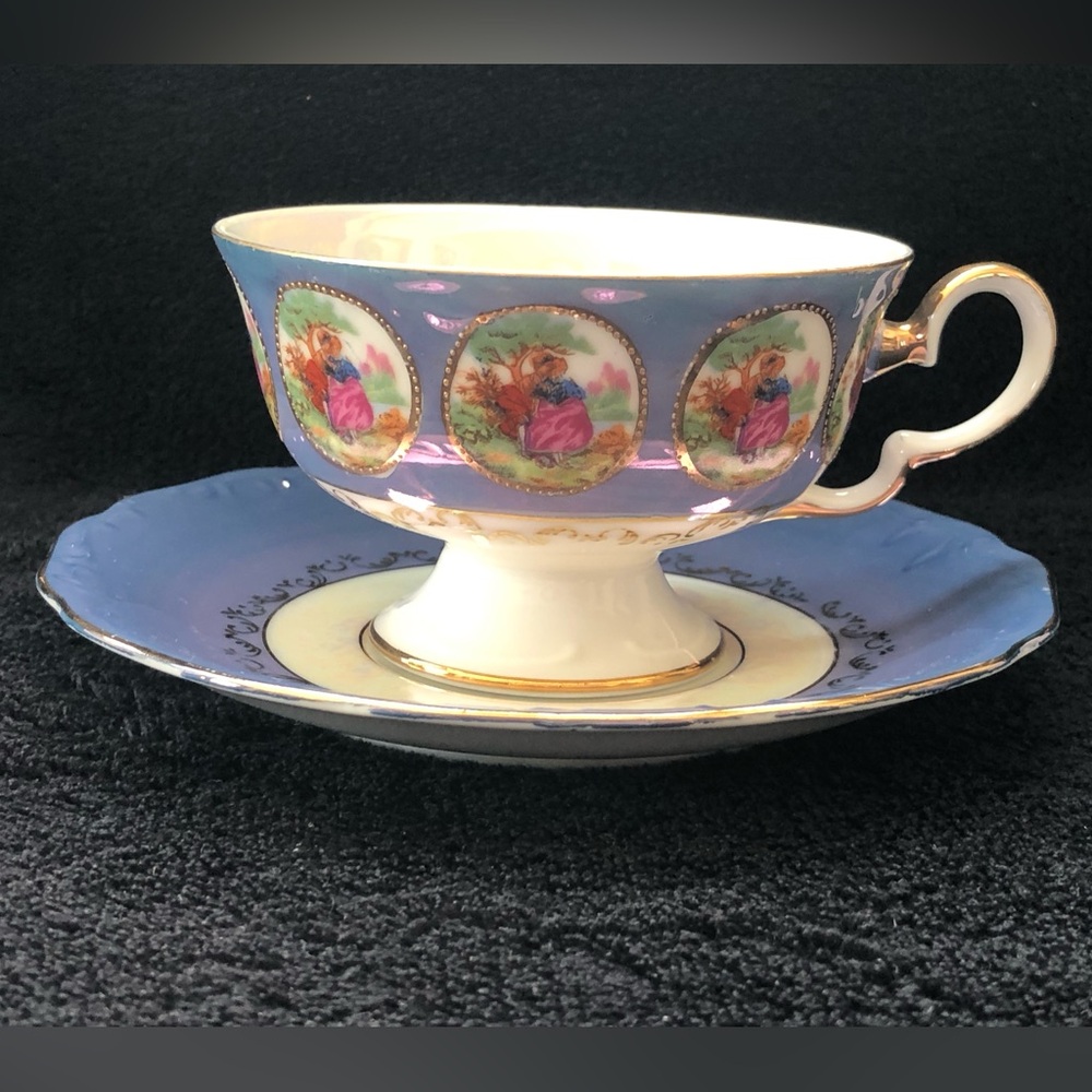 Unbranded Satyr Blue And White Iridecent Lusterware Tea Cup And Saucer